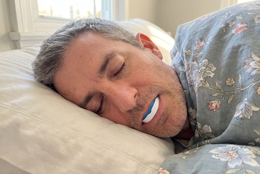 6:30am: he is still asleep with the mouth guard in