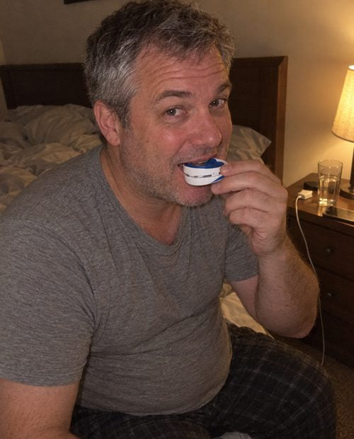 He puts the mouth guard in at bedtime